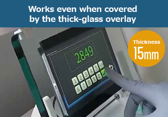 Works even when covered by the thick-glass overlay 